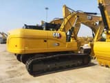2026 Caterpillar 320GX crawler excavator, rear three-quarter view