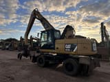 2012 Caterpillar M318D MH wheel excavator, rear three-quarter view