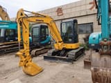 2018 Komatsu PC40 mini excavator, front three-quarter view