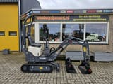 2023 Schaeff TC08 mini excavator, side view