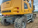 2023 Liebherr 914 Litronic wheel excavator rear three-quarter view