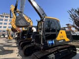2023 Volvo EC140 crawler excavator, side view