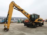2008 Caterpillar M322D material handler, side view