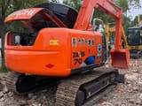 2024 Hitachi Zaxis 70 mini excavator, rear three-quarter view