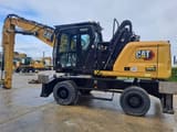 2021 Caterpillar MH3024 wheel excavator side view