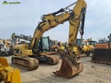 2008 Caterpillar 319DL crawler excavator, side view