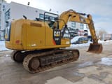 2019 Caterpillar 318FL crawler excavator, rear three-quarter view