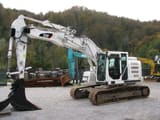 2014 Caterpillar 320EL crawler excavator, side profile view
