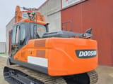2022 Doosan DX140LC-7 crawler excavator, rear three-quarter view
