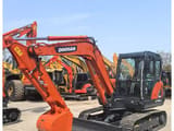 2024 Doosan DX60 mini excavator, side view