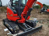 Kubota U25 mini excavator, front three-quarter view