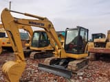 Komatsu PC56 mini excavator, front three-quarter view