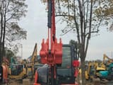 Kubota KX165 mini excavator, front view