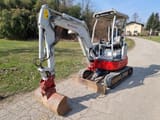 2018 Takeuchi TB23R mini excavator, front three-quarter view