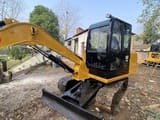 2022 Caterpillar 306E2 mini excavator, side view