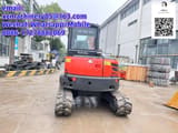 2024 Kubota KX057-4 mini excavator, rear view