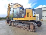 2019 Caterpillar 335F CR crawler excavator, rear three-quarter view
