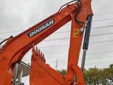 2023 Doosan DX55-9C mini excavator boom and bucket detail