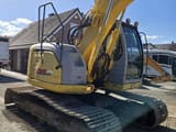 2006 New Holland E135SR-1E crawler excavator, rear three-quarter view