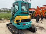 2022 Kubota U35 mini excavator, rear three-quarter view
