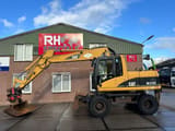 2003 Caterpillar M315C wheel excavator side view