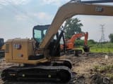 2019 Caterpillar 307E crawler excavator, rear three-quarter view