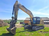 2021 Caterpillar 323-07 crawler excavator, side profile view