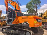 2024 Doosan DX225LCA crawler excavator, rear three-quarter view