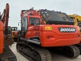 2023 Doosan DX225LC-9C crawler excavator, rear three-quarter view