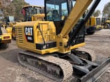 Caterpillar 306E2 mini excavator, side view