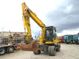 2016 Komatsu PW148-8 wheel excavator front three-quarter view