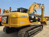 2023 Caterpillar 323D2L crawler excavator, rear three-quarter view