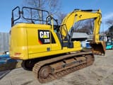 2018 Caterpillar 320-07A crawler excavator, rear three-quarter view