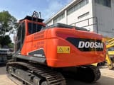 2023 Doosan DX225LCA crawler excavator, rear three-quarter view