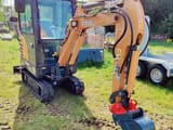 2022 CASE CX19C mini excavator, front three-quarter view