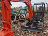 2022 Doosan DH55 mini excavator, front three-quarter view