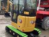 2023 Caterpillar 302 mini excavator, front three-quarter view