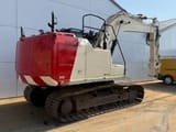 2012 Caterpillar 316EL crawler excavator, rear three-quarter view