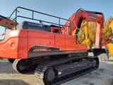 Doosan DX345LC-9C crawler excavator, rear three-quarter view