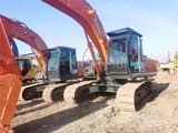 2023 Hitachi ZX210 crawler excavator, side view