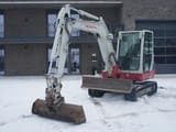 2012 Takeuchi TB250 mini excavator, side view