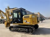 2023 Caterpillar 312D2 GC crawler excavator, rear three-quarter view