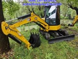 2023 Caterpillar 303.5 mini excavator, side view