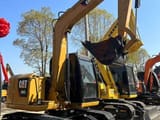 2025 Caterpillar 308E mini excavator, side profile view