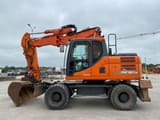 2016 Doosan DX160W wheel excavator, side profile view