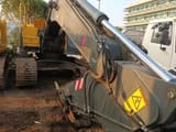 Volvo EC210BNL crawler excavator, front three-quarter view