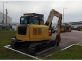 2019 Caterpillar 308E2CR crawler excavator rear three-quarter view