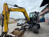 2020 Doosan DX57W-5 wheel excavator, front three-quarter view