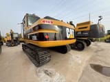 2013 Caterpillar 320BL crawler excavator, rear three-quarter view