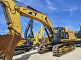 2023 Caterpillar 374F crawler excavator, side view